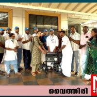 വീൽ ചെയർ കൈമാറി